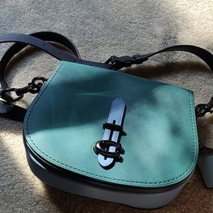 Coach saddle in color block